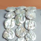 21-23mm White Coin Freshwater Pearls 15 inch 17 pieces - The Bead Traders