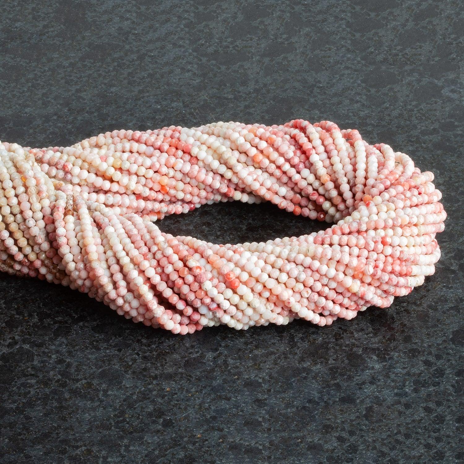 2.5mm Thulite Microfaceted Rounds 12 inch 130 beads - The Bead Traders