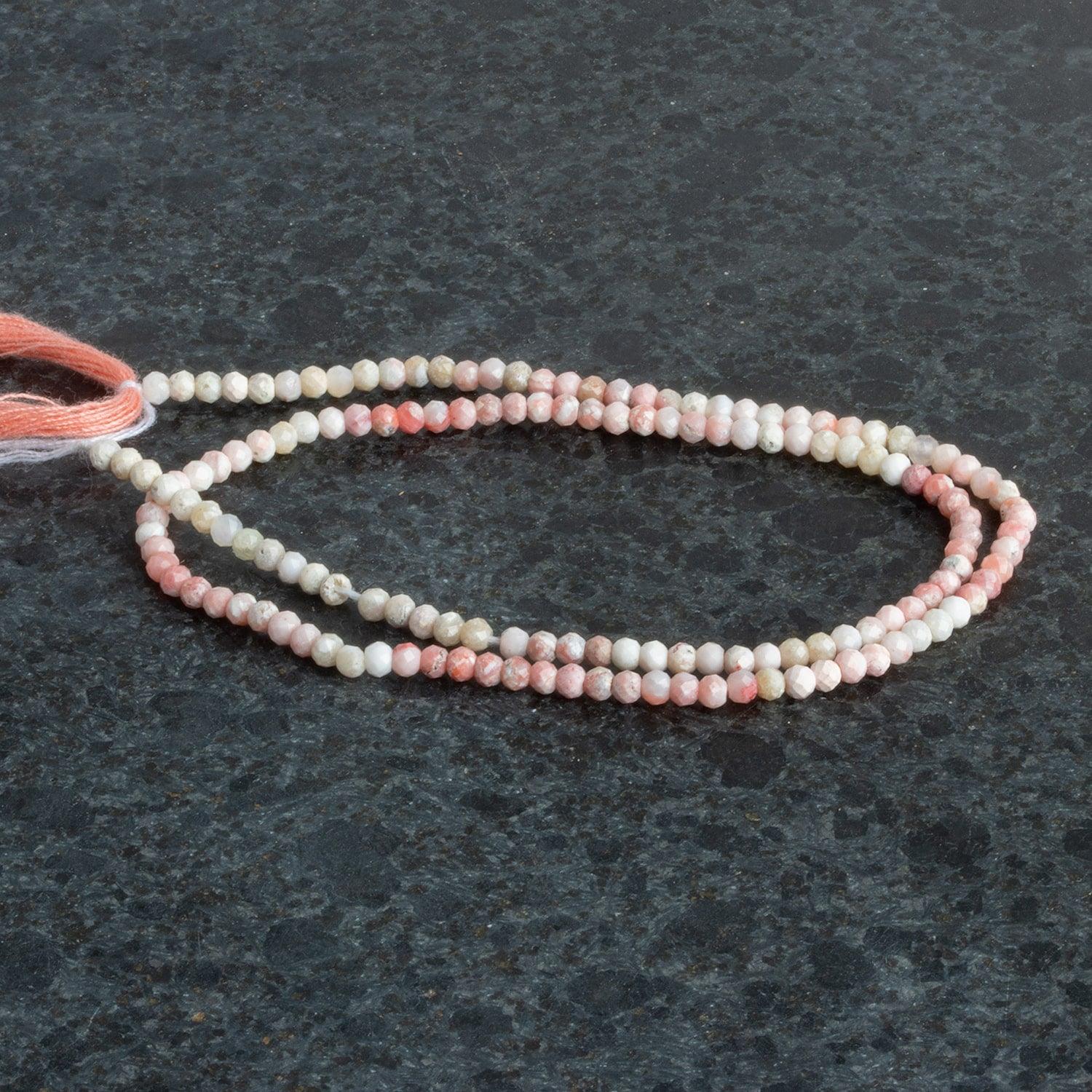2.5mm Thulite Microfaceted Rounds 12 inch 130 beads - The Bead Traders