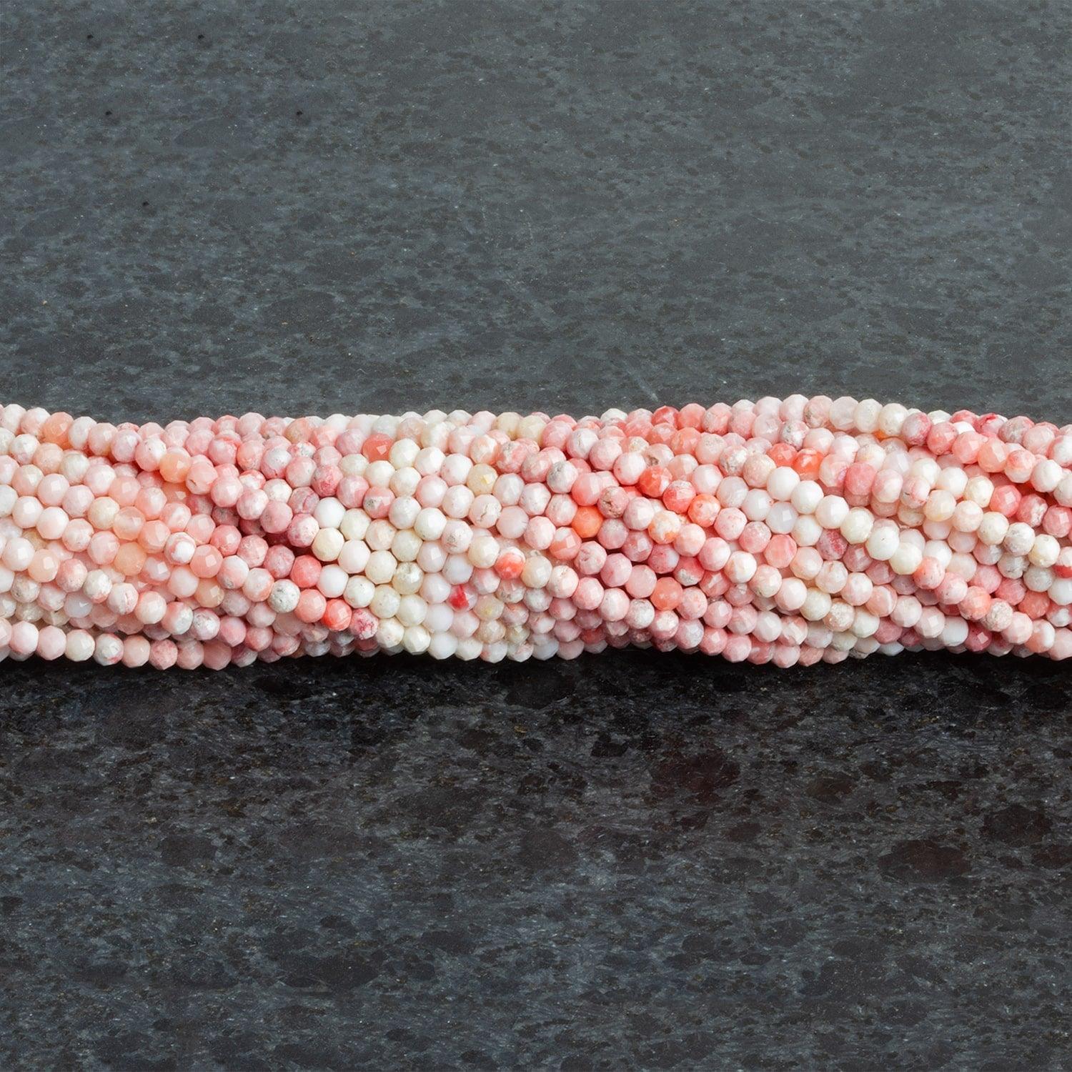 2.5mm Thulite Microfaceted Rounds 12 inch 130 beads - The Bead Traders
