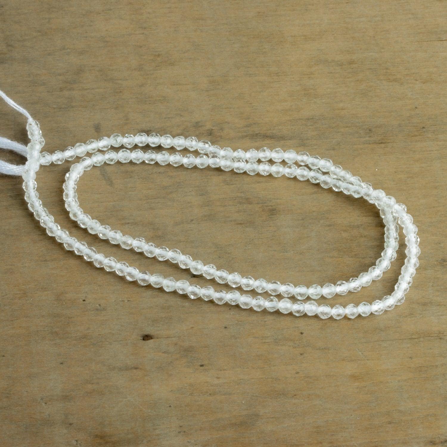 2.5mm White Topaz Microfaceted Rounds 12 inch 130 beads - The Bead Traders