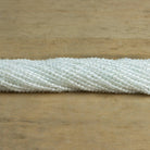 2.5mm White Topaz Microfaceted Rounds 12 inch 130 beads - The Bead Traders