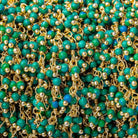 2mm Blue and Green Howlite Gold plated Dangling Chain by the foot - The Bead Traders