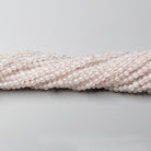 2mm Crystal Quartz plain rounds 13 inches 180 beads - The Bead Traders