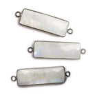 31x11mm Black Gold Bezeled Rainbow Moonstone Bar Pendant 1 Piece - The Bead Traders