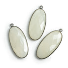 34x16mm Black Gold Bezeled White Moonstone Pendant 1 bead - The Bead Traders