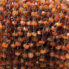 3.5-4.5mm Shaded Carnelian plain rondelle Black Gold Chain by the foot 37 pcs - The Bead Traders