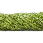 3.5-4mm Peridot Plain Coin Beads, 14 inch - The Bead Traders