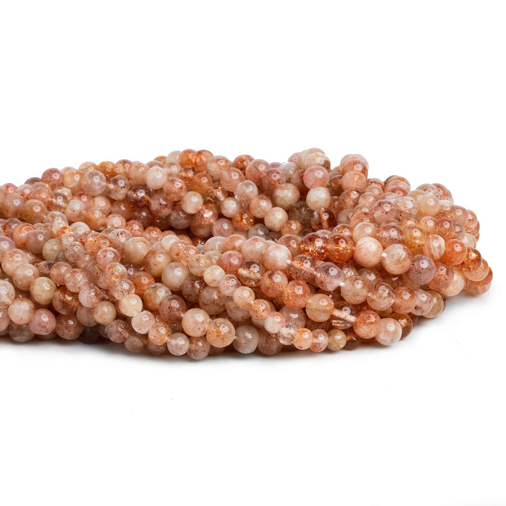 3.5-5mm Sunstone Handcut Rounds 12 inch 70 pieces - The Bead Traders