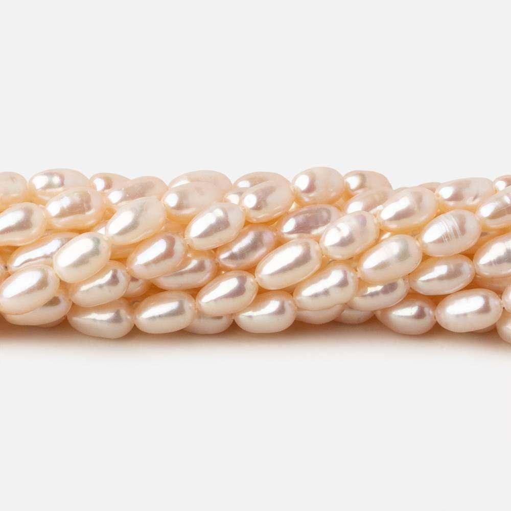 3.5x5-3.5x7.5mm Off White straight drilled Oval freshwater pearls 15.5 inch 65 pieces A - The Bead Traders