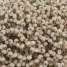 3mm Angel Skin Peach Crystal rondelle Black Dangling Chain by the foot 97 beads - The Bead Traders