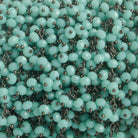 3mm Robin's Egg Blue Crystal rondelle Black Dangling Chain by the foot 97 beads - The Bead Traders
