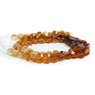 4-5mm Hessonite Garnet Faceted Coins 14 inch 75 beads - The Bead Traders
