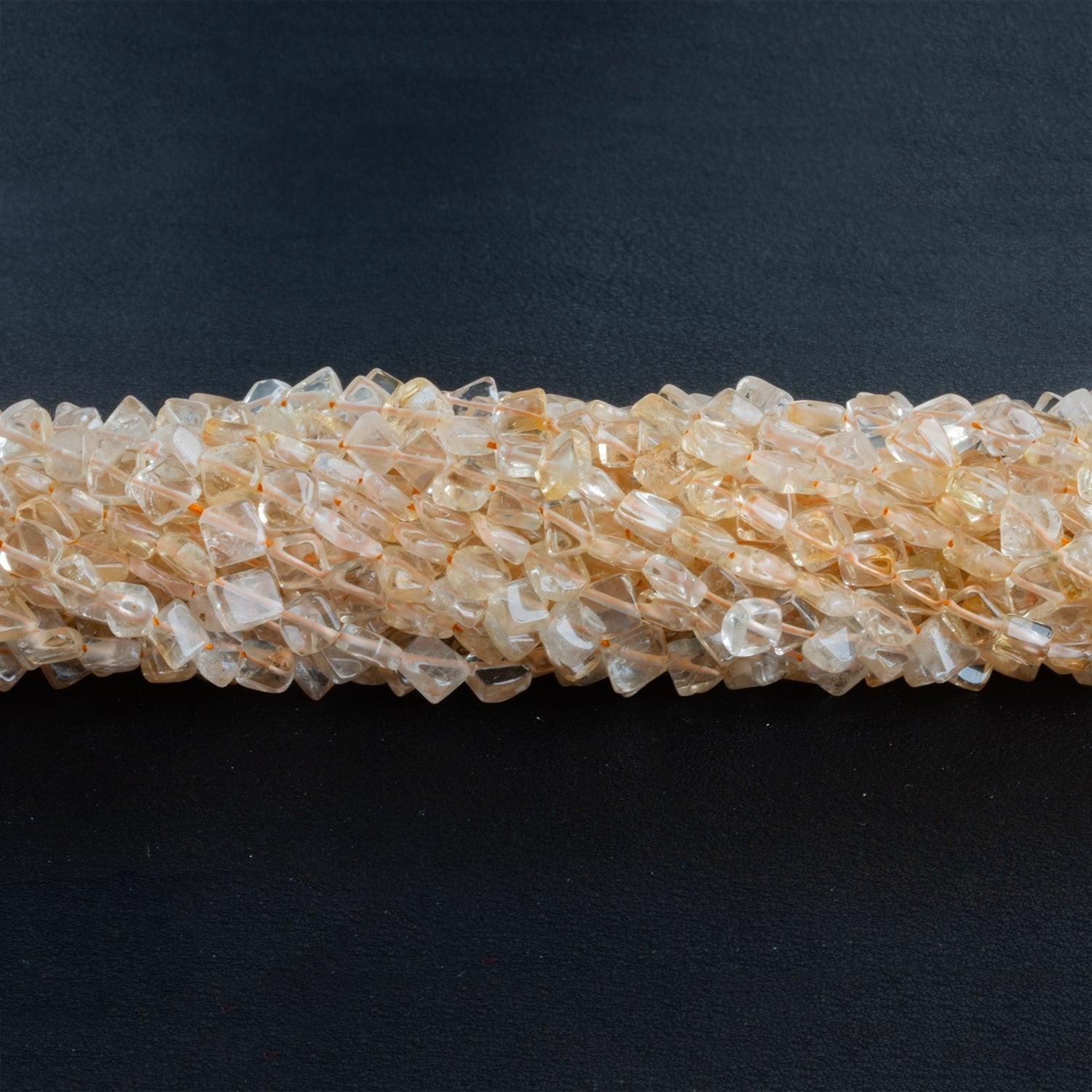 4-5mm Light Citrine Plain Diamonds 13 inch 65 beads - The Bead Traders