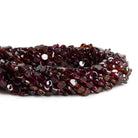 4-6mm Garnet Plain Coins 14 inch 61 beads - The Bead Traders