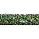 4-6mm Green Apatite Plain Coins 13 inch 60 beads - The Bead Traders
