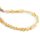 4-7mm Citrine Faceted Hearts 8 inch 58 beads - The Bead Traders