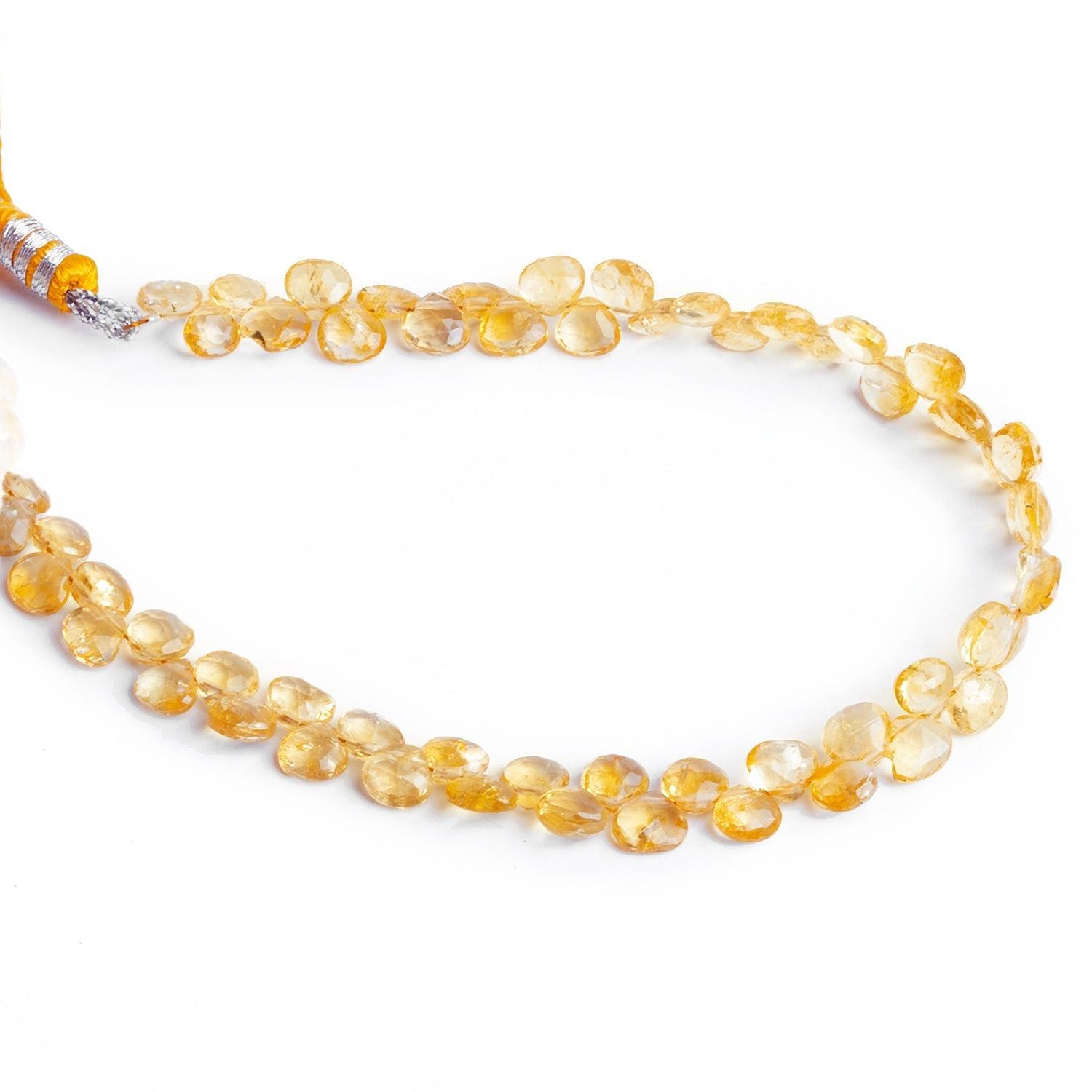 4-7mm Citrine Faceted Hearts 8 inch 58 beads - The Bead Traders