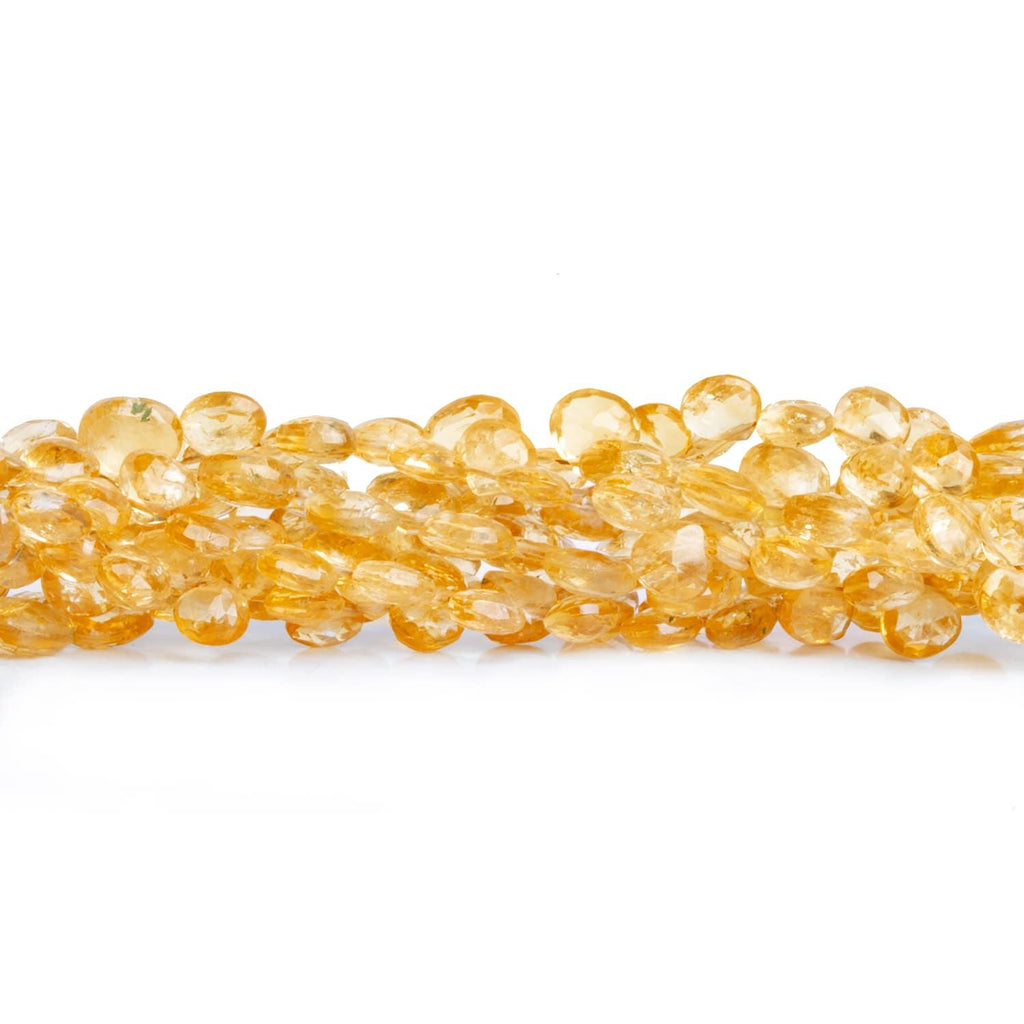 4-7mm Citrine Faceted Hearts 8 inch 58 beads - The Bead Traders