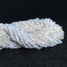 4-7mm Rainbow Moonstone Handcut Coins 12 inch 40 beads - The Bead Traders