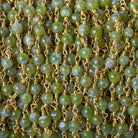 4mm Idocrase plain round Gold plated Chain by the foot 31 beads - The Bead Traders