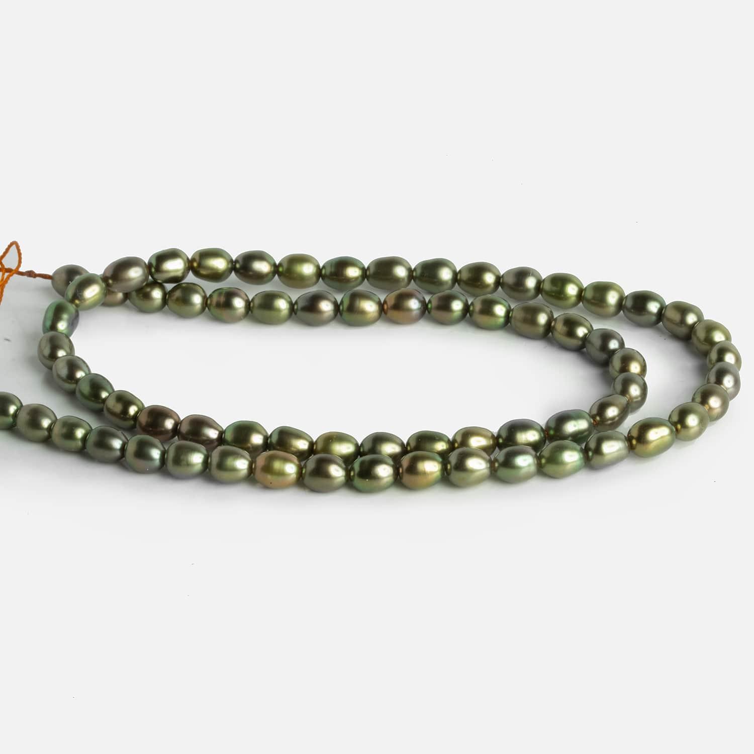 4x5mm Copper Green Oval Pearls 15 inch 63 beads - The Bead Traders