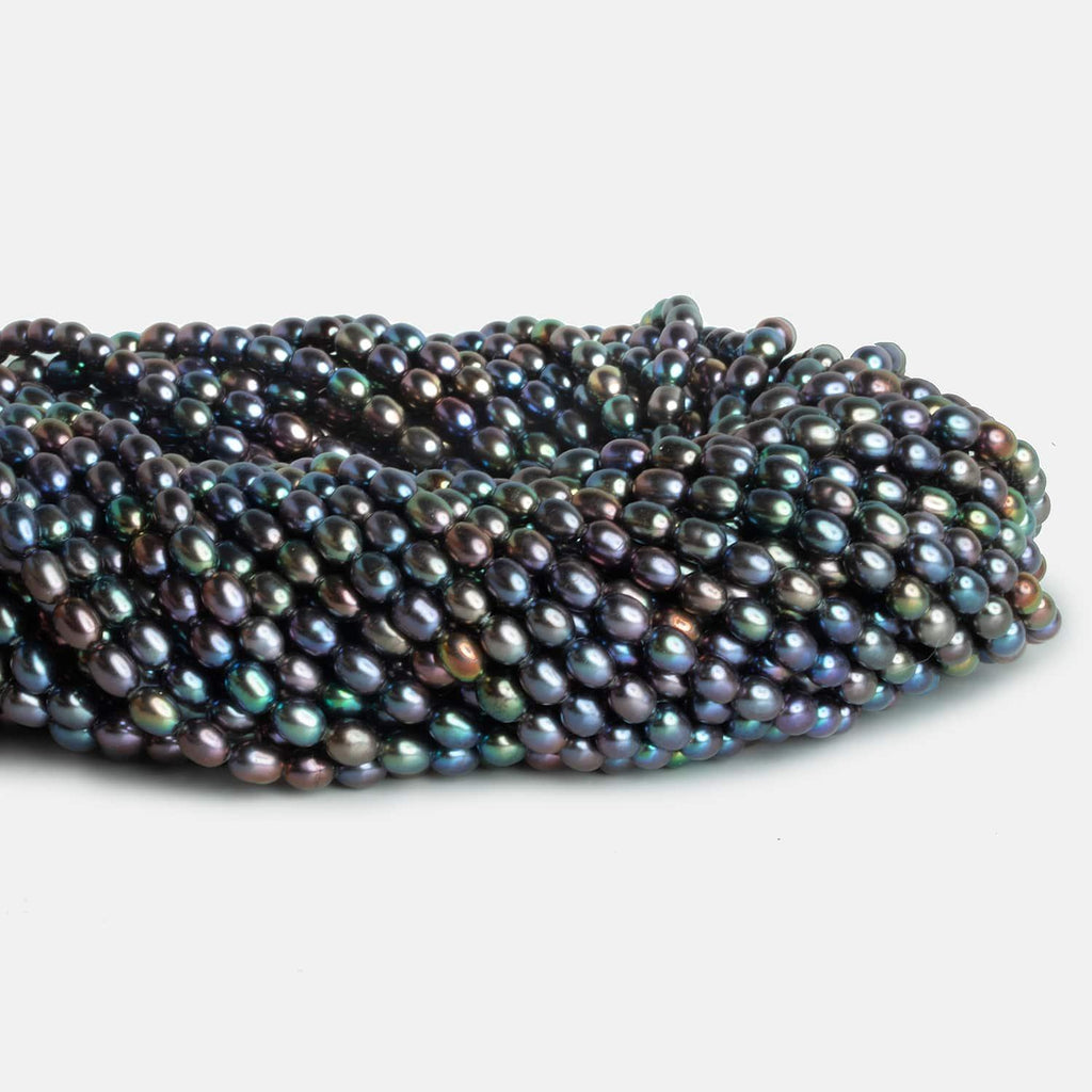 4x5mm Peacock Oval Pearls 15 inch 70 beads - The Bead Traders