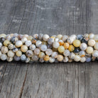 5-6.5mm Dendritic Opal plain round beads 13 inch 52 pieces - The Bead Traders