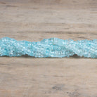 5-6mm Aquamarine Plain Heishi Beads 12 inch 150 pieces - The Bead Traders
