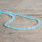 5-6mm Aquamarine Plain Heishi Beads 12 inch 150 pieces - The Bead Traders