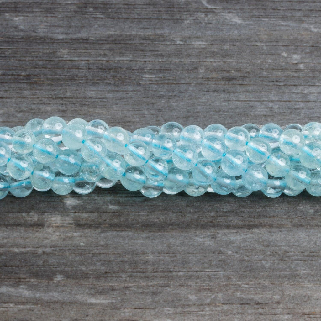 5-6mm Aquamarine Plain Rounds 16 inch 75 beads - The Bead Traders