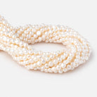 5-6mm Cream Baroque 2mm Large Hole Pearls 15 inch 64 pieces - The Bead Traders