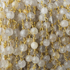 5mm-6mm Rutilated Quartz Plain Rounds Gold plated Chain by the foot 25 pieces - The Bead Traders