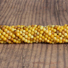 5mm Yellow Opal Plain Rounds 12 inch 60 beads - The Bead Traders