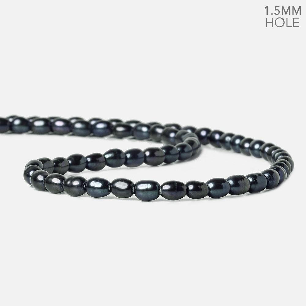 5x4-6x4mm Peacock Blue Large Hole Oval Freshwater Pearls 1.5mm drill hole 15 inch 64 pcs - The Bead Traders