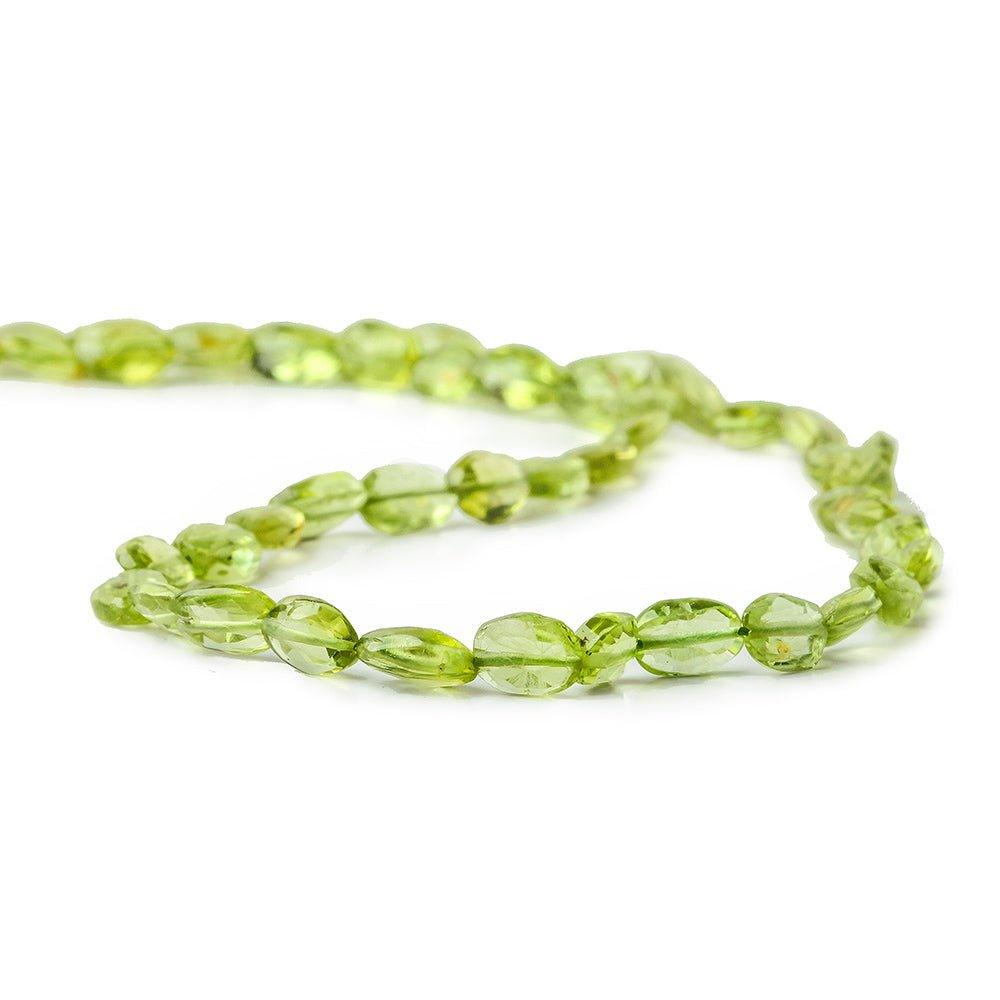 5x4-7x5mm Peridot faceted oval beads 13 inch 50 pieces - The Bead Traders