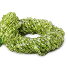 5x4-7x5mm Peridot faceted oval beads 13 inch 50 pieces - The Bead Traders