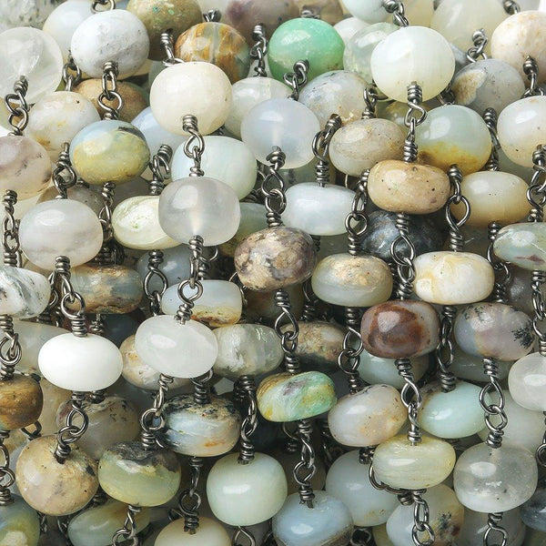 6-7mm Blue Peruvian Opal Plain Rondelle Black Gold plated Chain by the foot