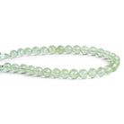 6-7mm Prasiolite Faceted Rounds 7.5 inch 28 beads - The Bead Traders