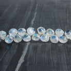6-7mm Rainbow Moonstone Faceted Hearts 8 inch 52 beads - The Bead Traders