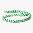 6.5mm Lime Green Button Freshwater Pearls 16 inches 62 pieces - The Bead Traders