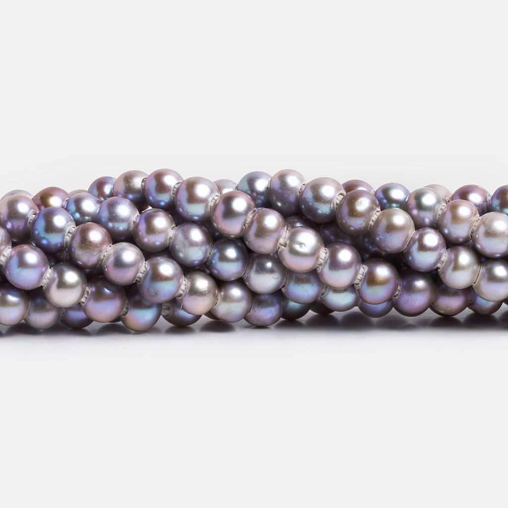 6.5mm Silvery Purple Large Hole Off Round Pearls 15 inch 70 pieces - The Bead Traders