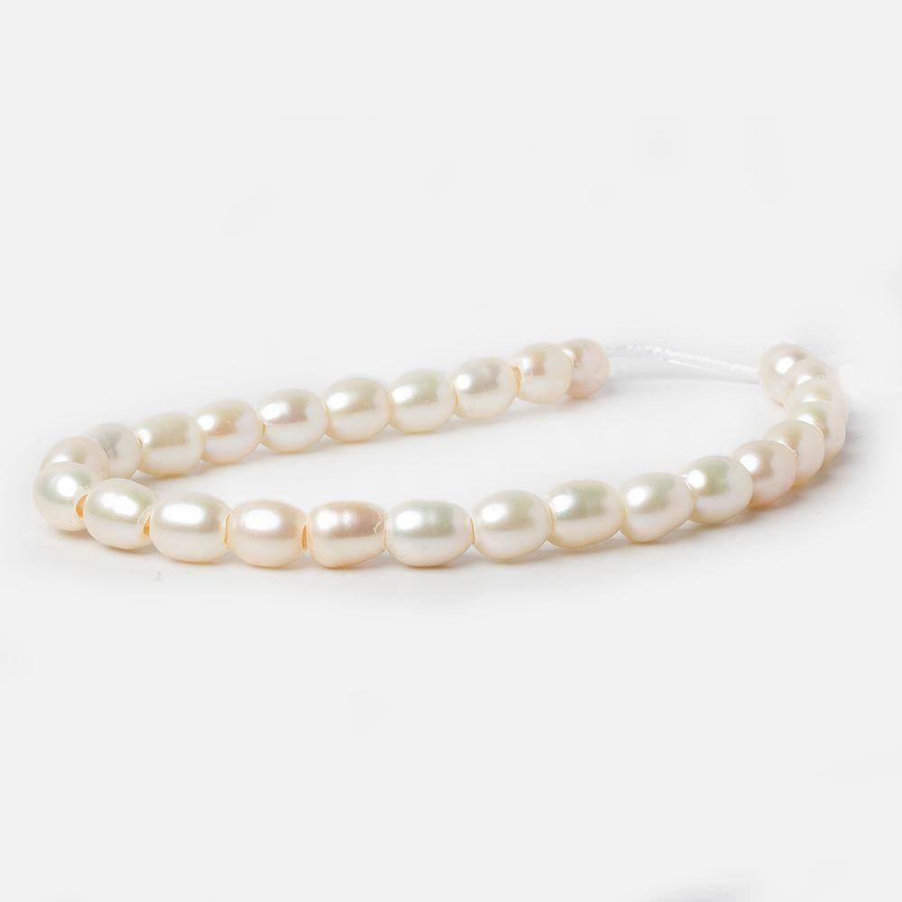 6.5x7mm Off White 2.5mm Large Hole Oval Freshwater Pearls 8 inch 27 pieces - The Bead Traders