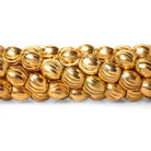 6mm 22kt Gold Plated Brass Scallop Ovals Beads, 8 inch, 37 beads - The Bead Traders