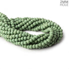 6mm Grass Green Lava Rock plain rounds 16 inch 64 beads - The Bead Traders