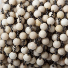 6mm Matte River Stone plain round Black Gold Chain by the foot 24 pieces - The Bead Traders