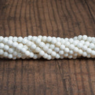 6mm White Jade Plain Rounds 15 inch 65 beads - The Bead Traders