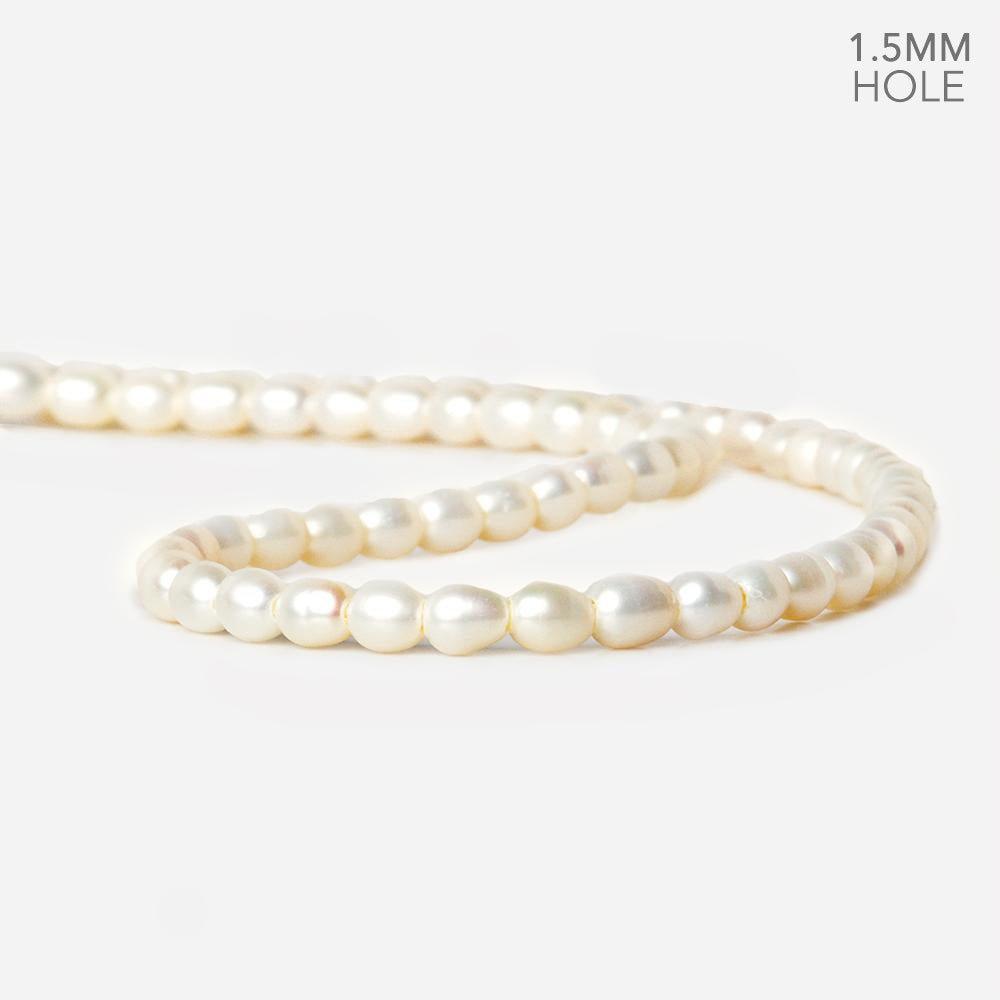 6x4mm Cream Large Hole Oval Freshwater Pearls 1.5mm drill hole 15 inch 62 pcs - The Bead Traders