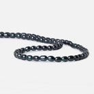 6x4mm Navy Peacock Large Hole Oval Pearls 15 inch 64 pieces - The Bead Traders