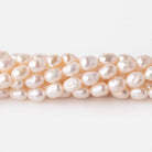 6x4mm Off White Oval Freshwater Pearl 61 pieces - The Bead Traders